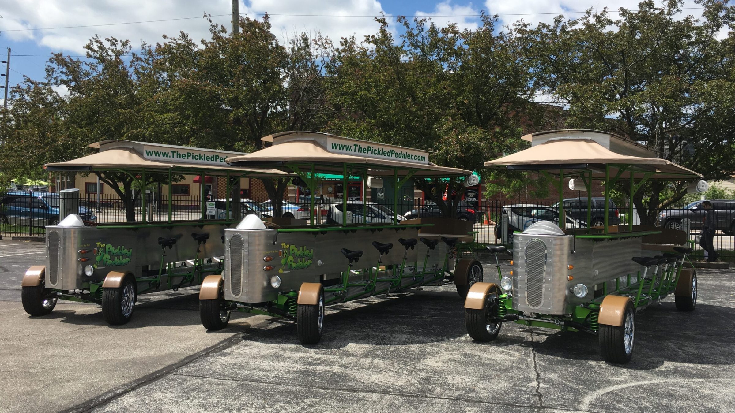 a group of people sitting in a parking lot