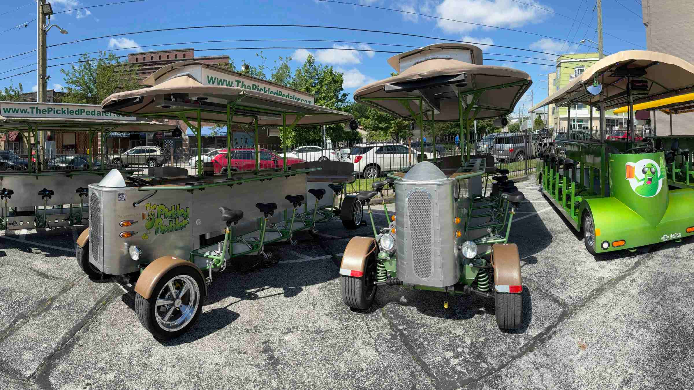 a group of people sitting in a parking lot